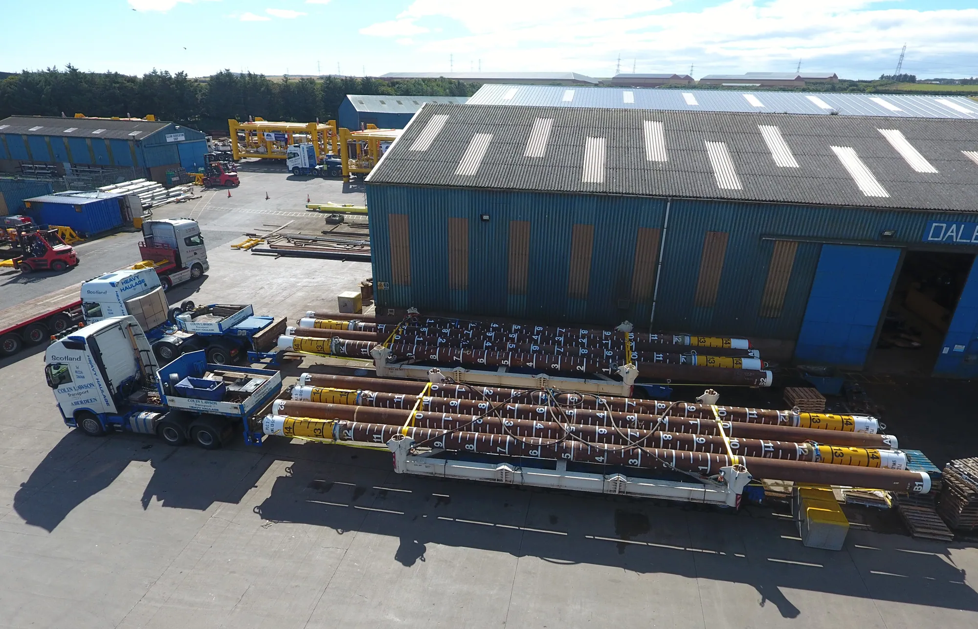 Fabricated structures loaded for delivery at the Dales yard